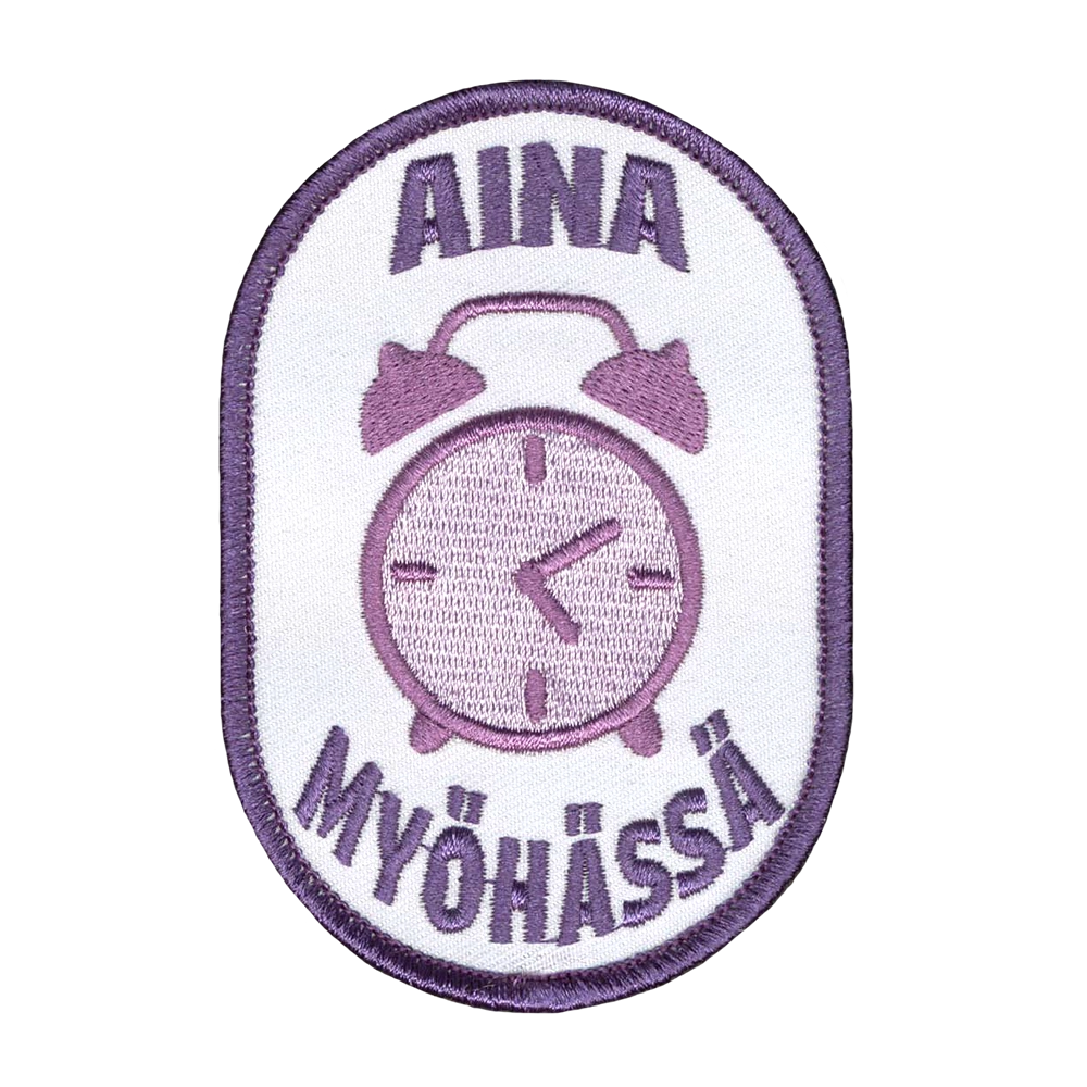 Brodeerattu haalarimerkki, kello, teksti: Aina myöhässä.