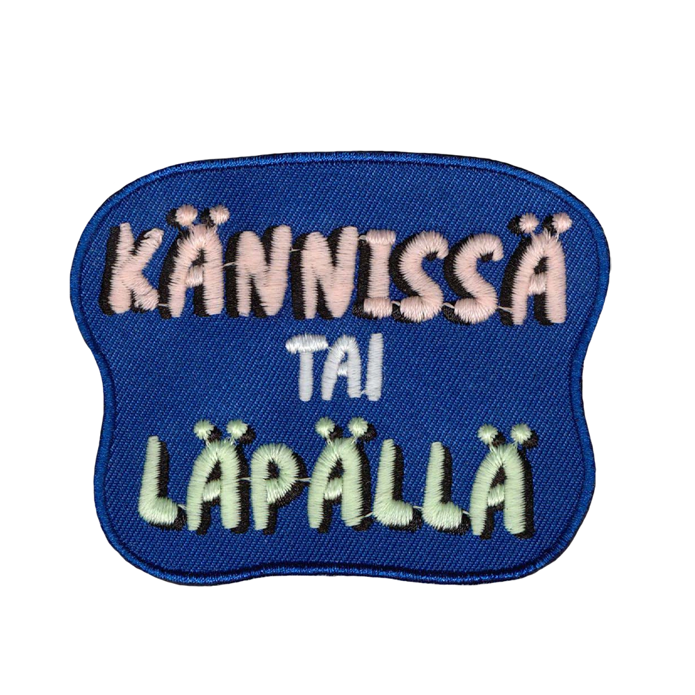 Brodeerattu kangasmerkki.