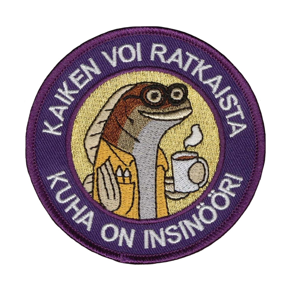 Brodeerattu kangasmerkki, kuha, teksti: Kaiken voi ratkaista kuha on insinööri.