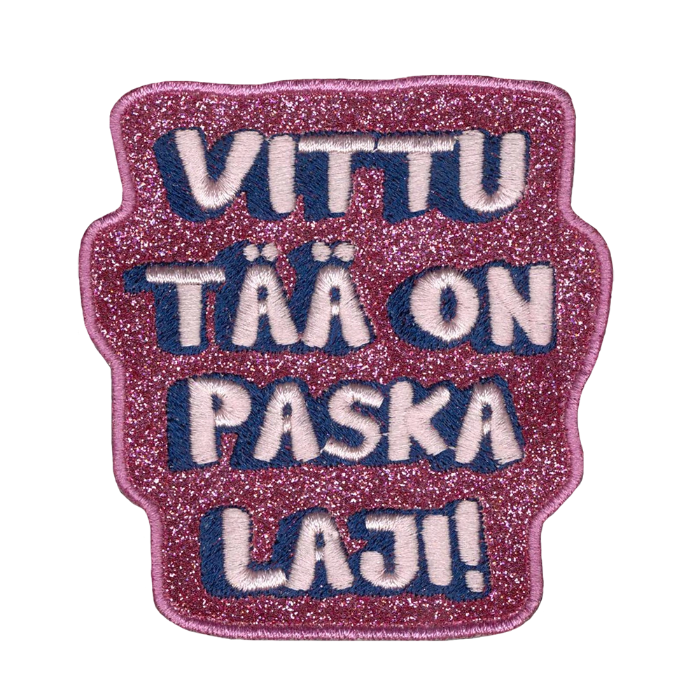Brodeerattu haalarimerkki, glitterkangas, teksti: Vittu tää on paska laji.