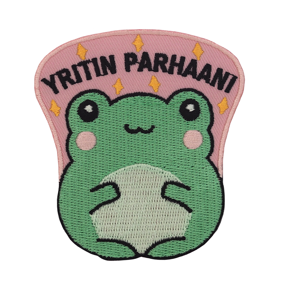 Brodeerattu merkki, sammakko, teksti: Yritin parhaani.