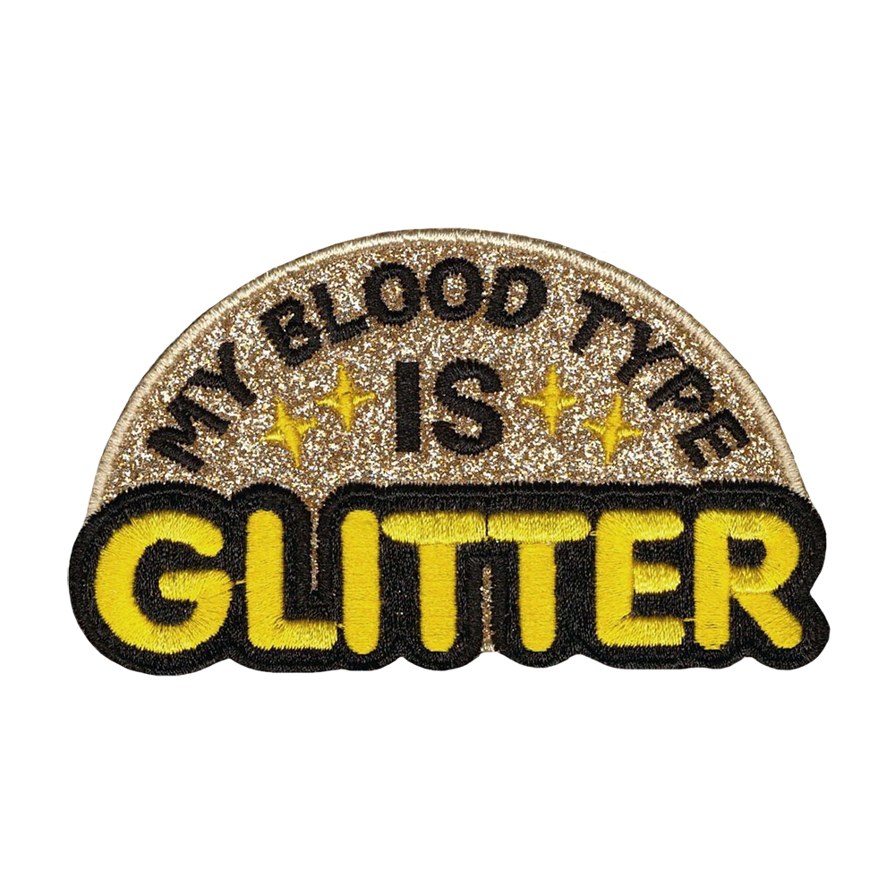 Glitter kangasmerkki.