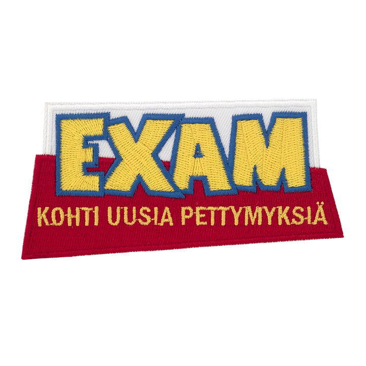 Brodeerattu haalarimerkki, teksti: Exam - kohti uusia pettymyksiä.