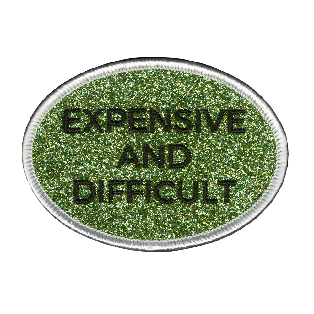 Brodeerattu glitterkangasmerkki, vihreä.