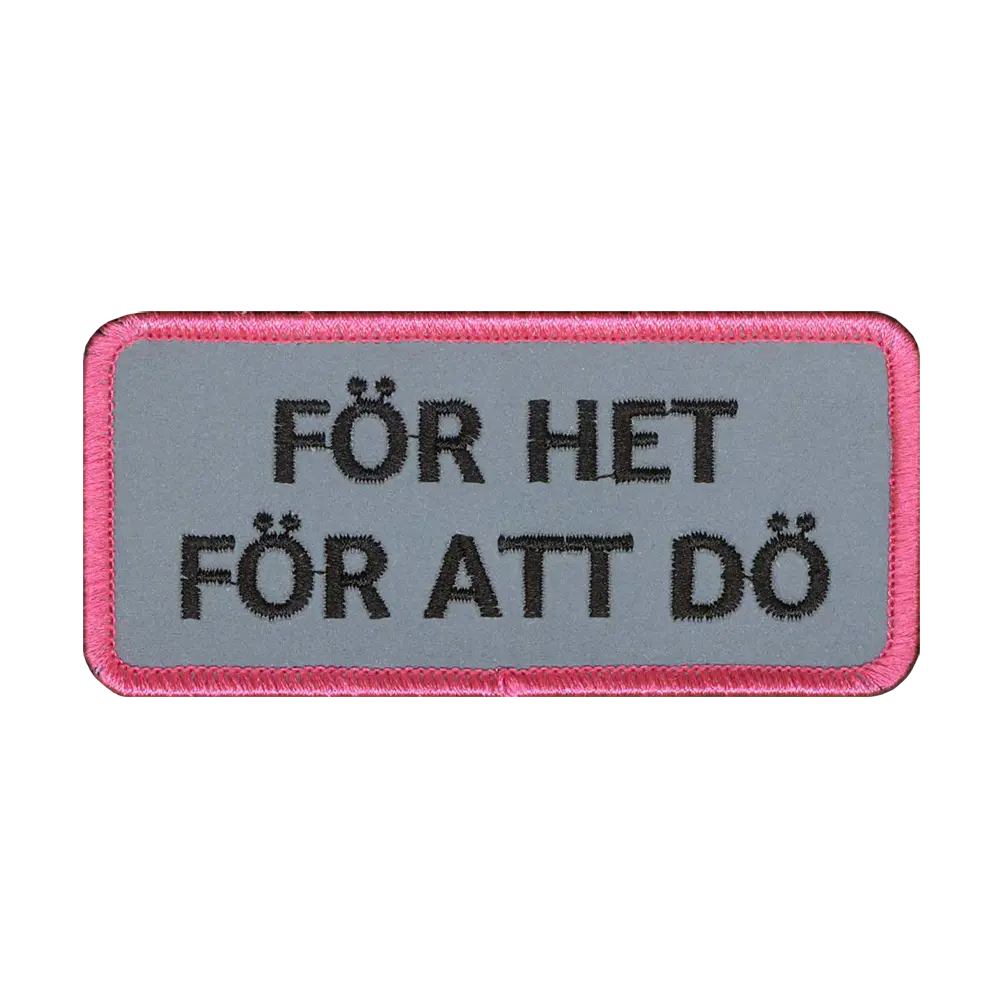 Brodeerattu heijastava kangasmerkki.