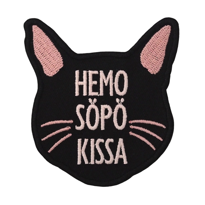 Brodeerattu kissa-haalarimerkki, teksti: Hemo söpö kissa.