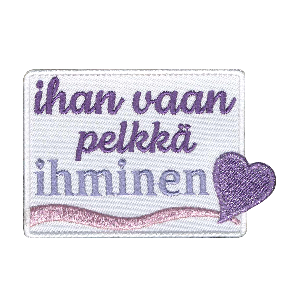 Brodeerattu kangasmerkki.