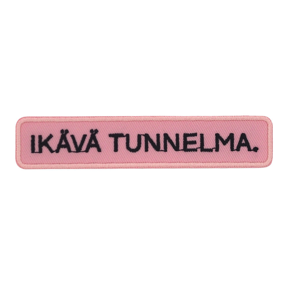 Brodeerattu kangasmerkki, teksti: Ikävä tunnelma.