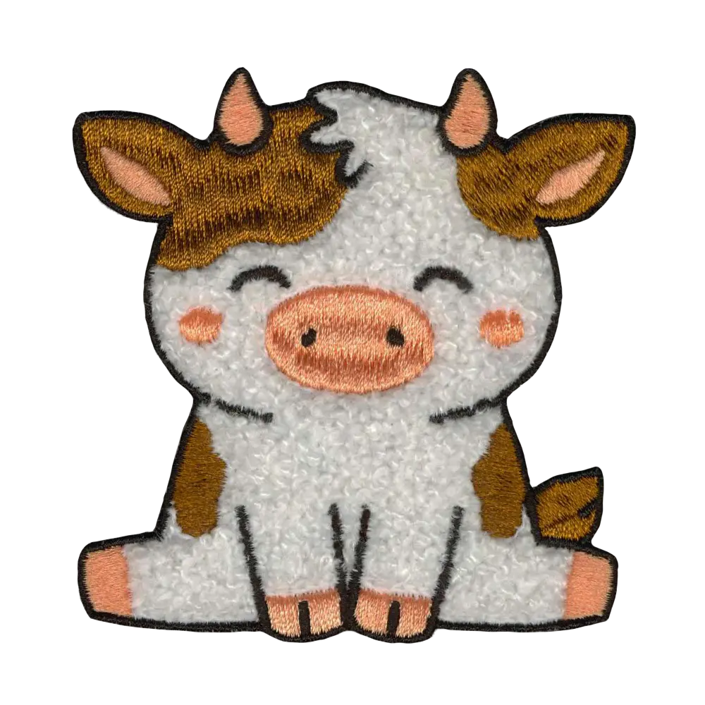Brodeerattu pörrömerkki, lehmä.