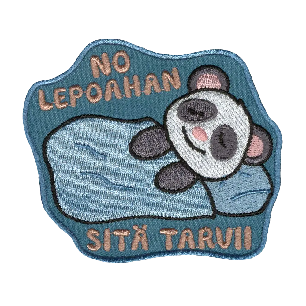 Brodeerattu kangasmerkki, panda.