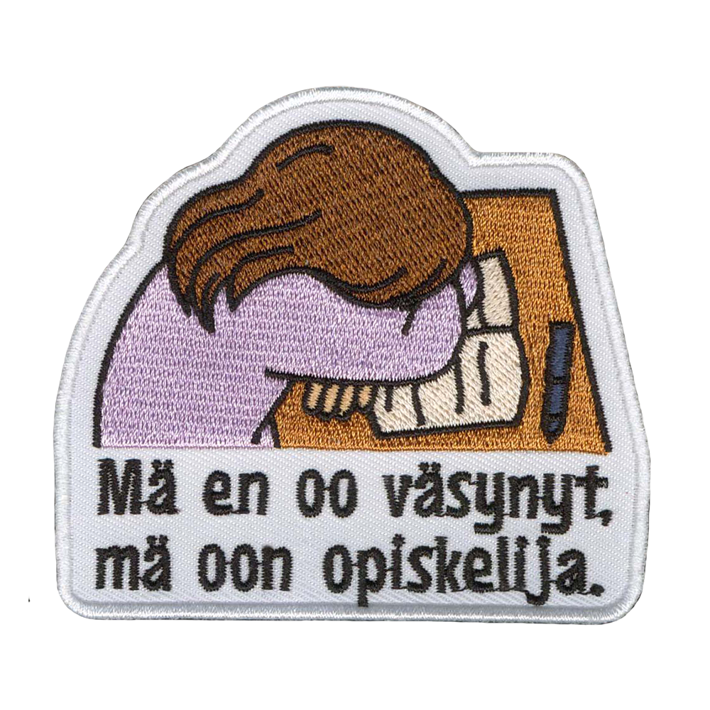 Brodeerattu kangasmerkki, väsynyt opiskelija.