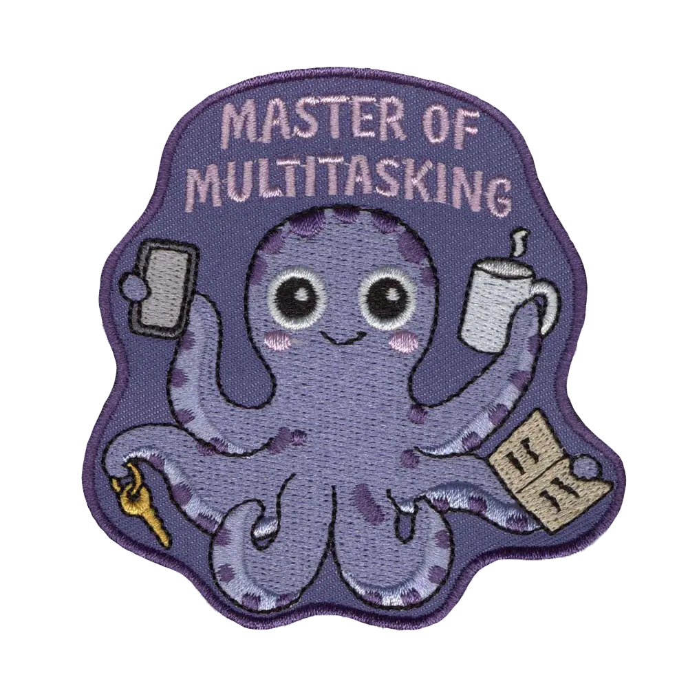 Brodeerattu kangasmerkki, mustekala.