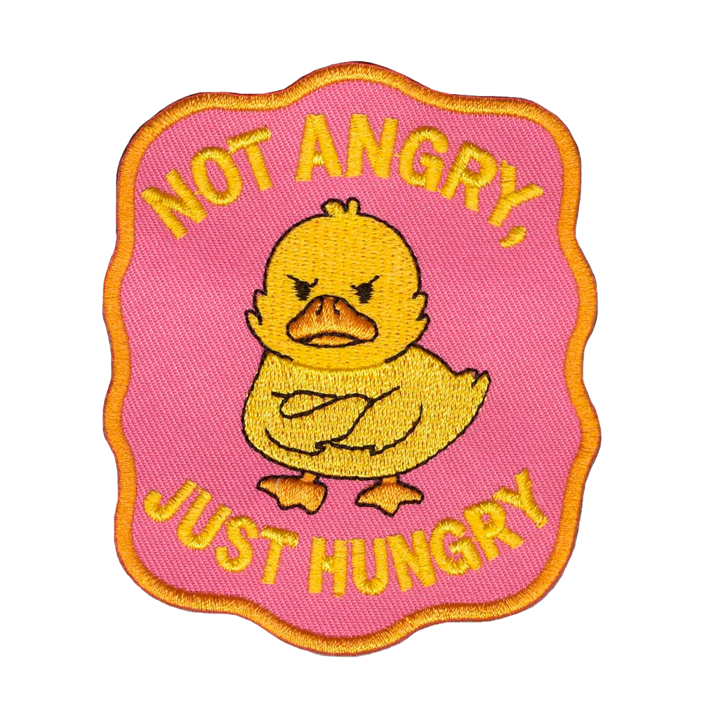 Brodeerattu kangasmerkki, tipu, teksti: Not angry, just hungry.