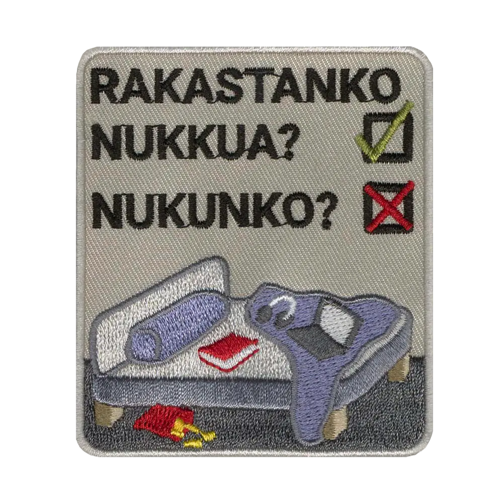 Brodeerattu kangasmerkki, nukkuminen.