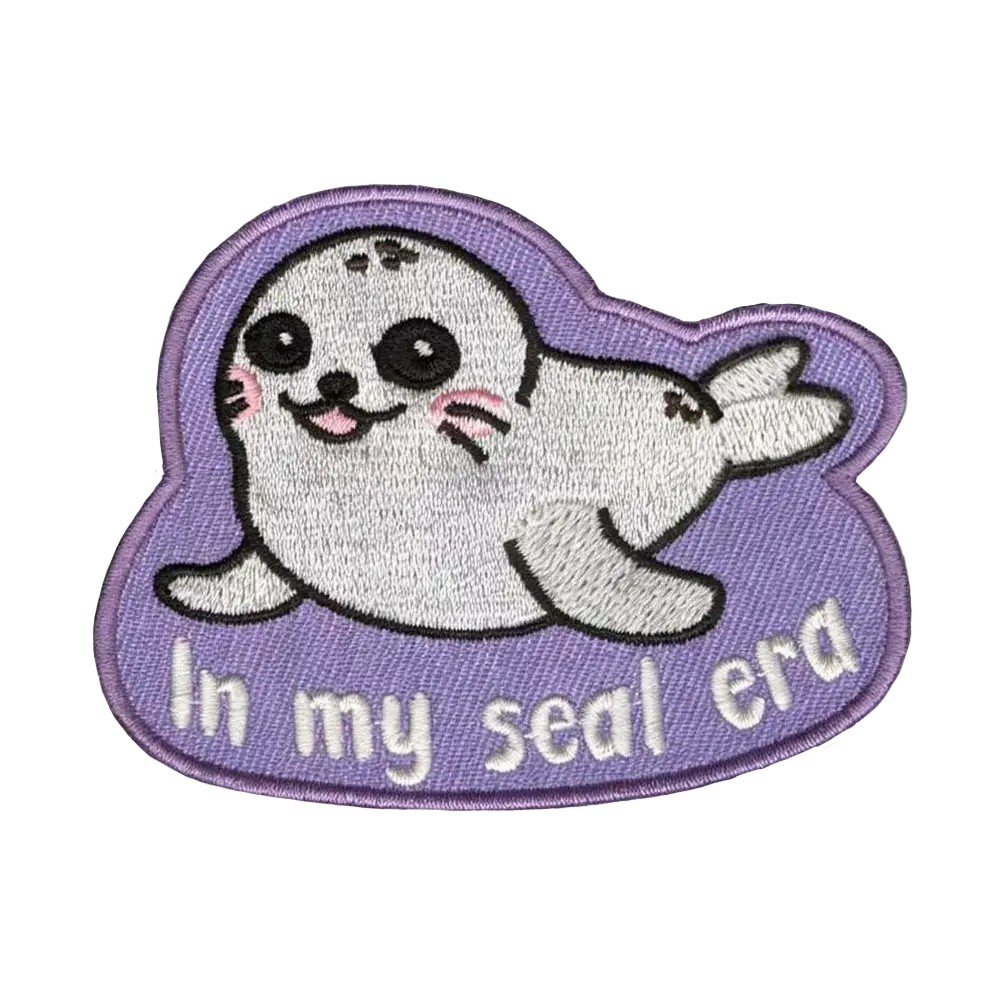 Brodeerattu kangasmerkki, in my seal era.