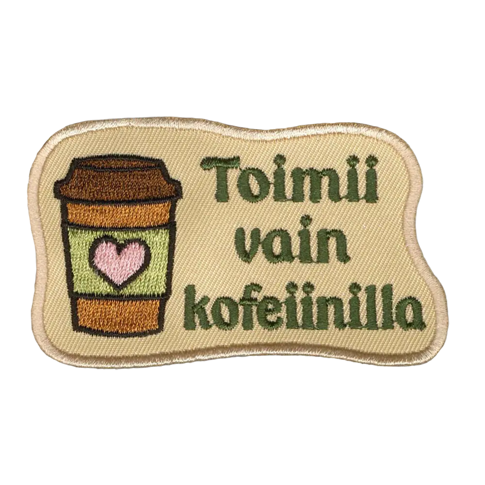 Brodeerattu kangasmerkkki, teksti: Toimii vain kofeiinilla.