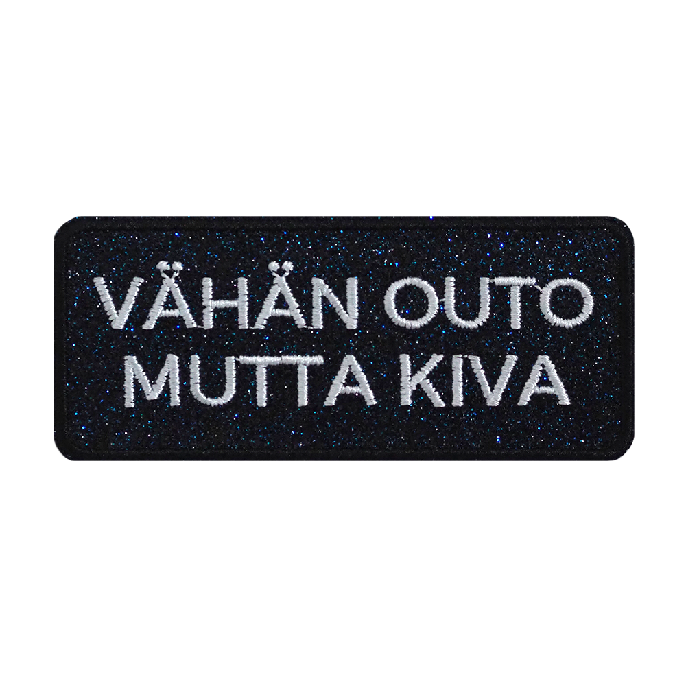 Brodeerattu glitterkangasmerkki.